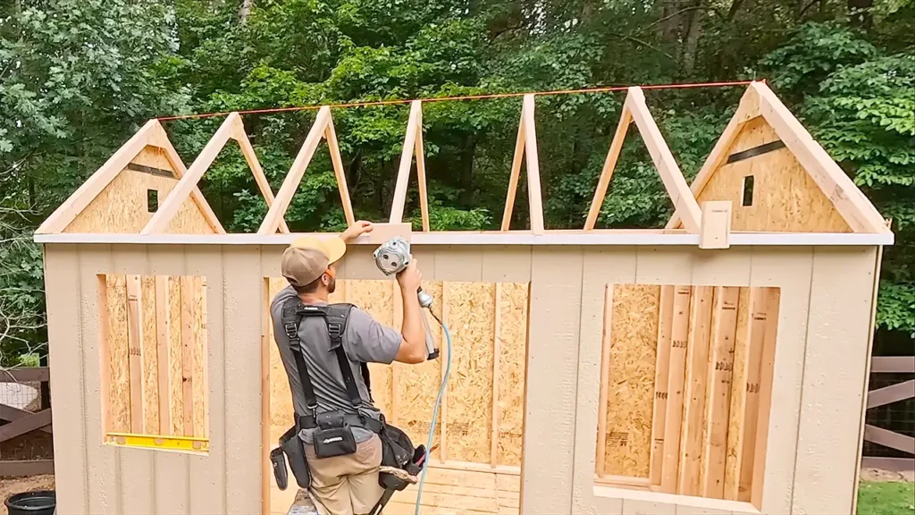 A local builder constructing a shed.